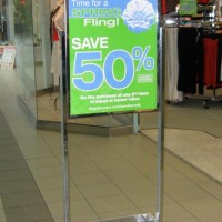 This frame holds posters or signs easily for indoor spaces like a shopping mall. Easily interchangeable messages