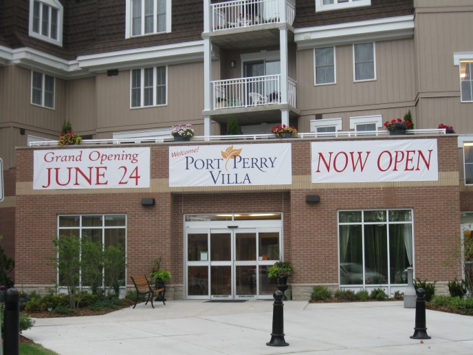 Using separate banners gives a temporary fix while figuring out what you really want to do permanent to the space provided you. In this case, the 2 outside banners came down after a few months and the middle one stayed up another year - now we are working on a permanent sign for this space.