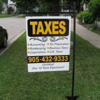 This portable lawn sign worked well for this client with her storefront, vehicle and business cards all created to match.