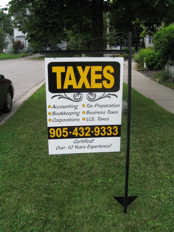 This portable lawn sign worked well for this client with her storefront, vehicle and business cards all created to match.