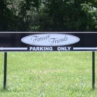 Instead of using many different parking signs, why not designate an entire area for your parking, giving it a clean, professional look?