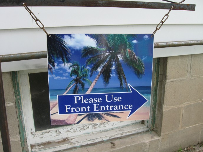 Aluminum digital image on hangar to show direction traffic is supposed to use.... very handy!
