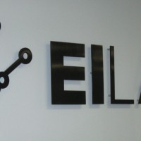 Formed plastic Channel lettering using logo, attached to wall using studs and spacers.... very professional look!